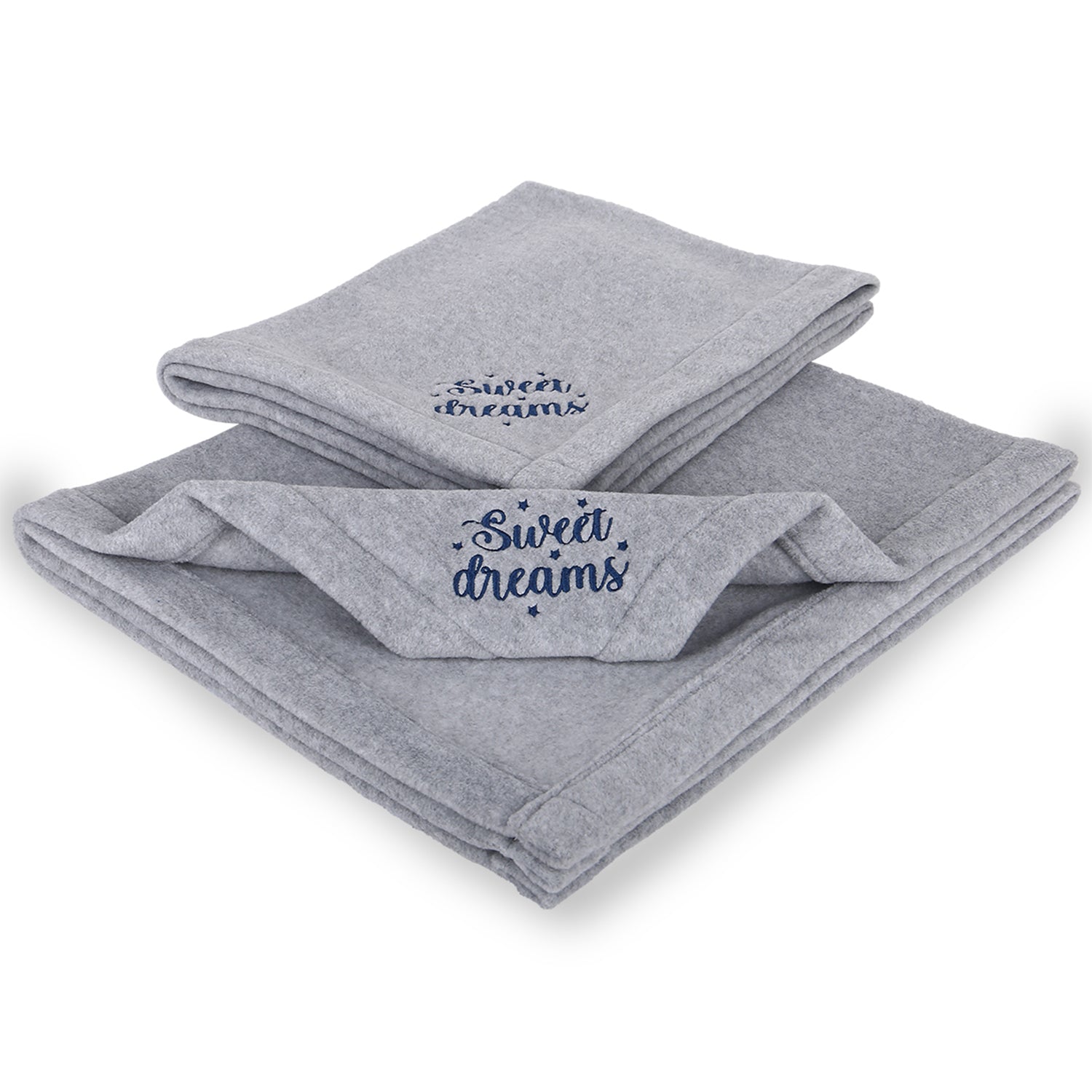 Soft grey fleece blankets with 'Sweet dreams' embroidery, neatly folded.