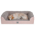 Beige dog sleeping on a soft pink and gray rectangular pet bed