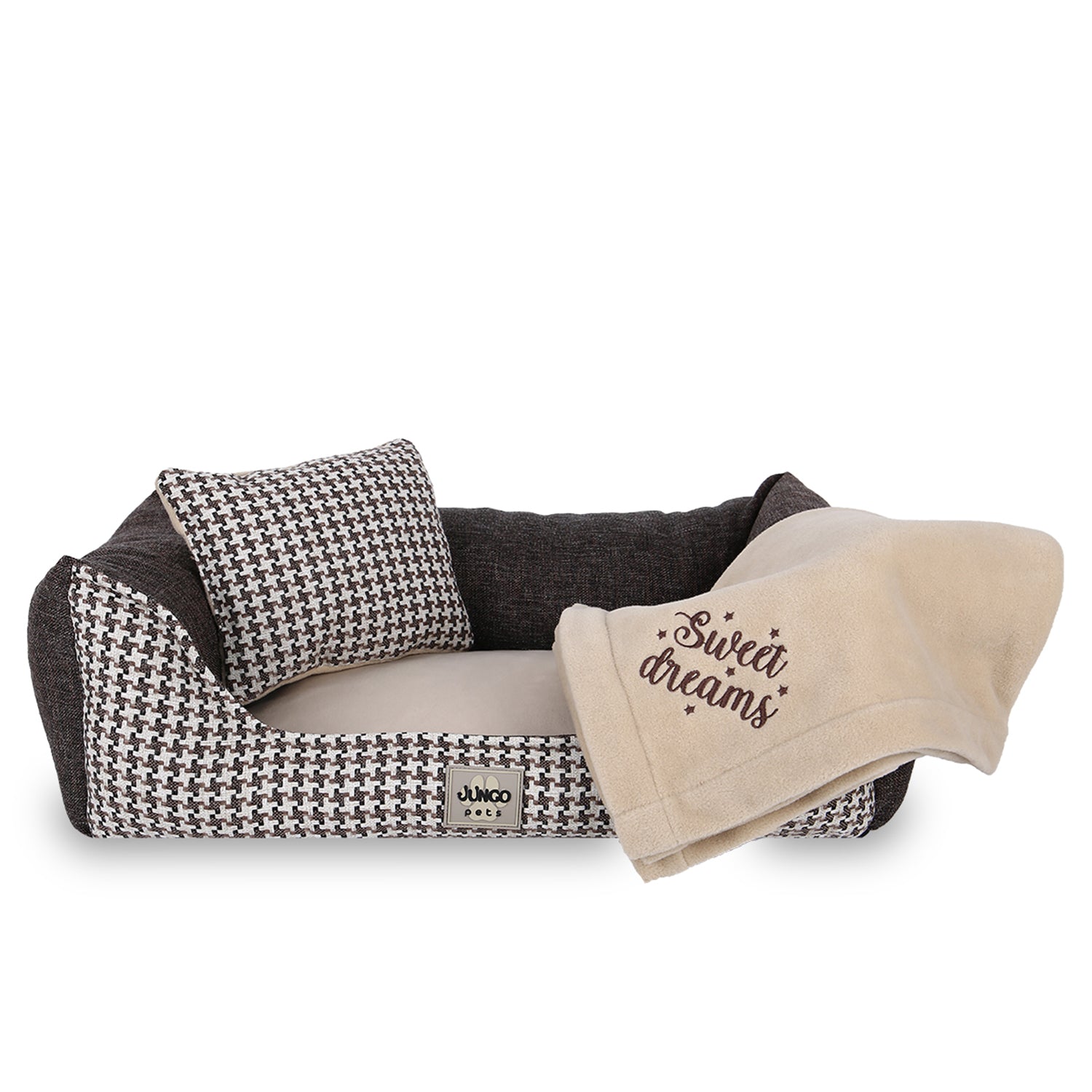 Houndstooth dog bed with matching cushion and beige blanket embroidered with 'Sweet dreams'.