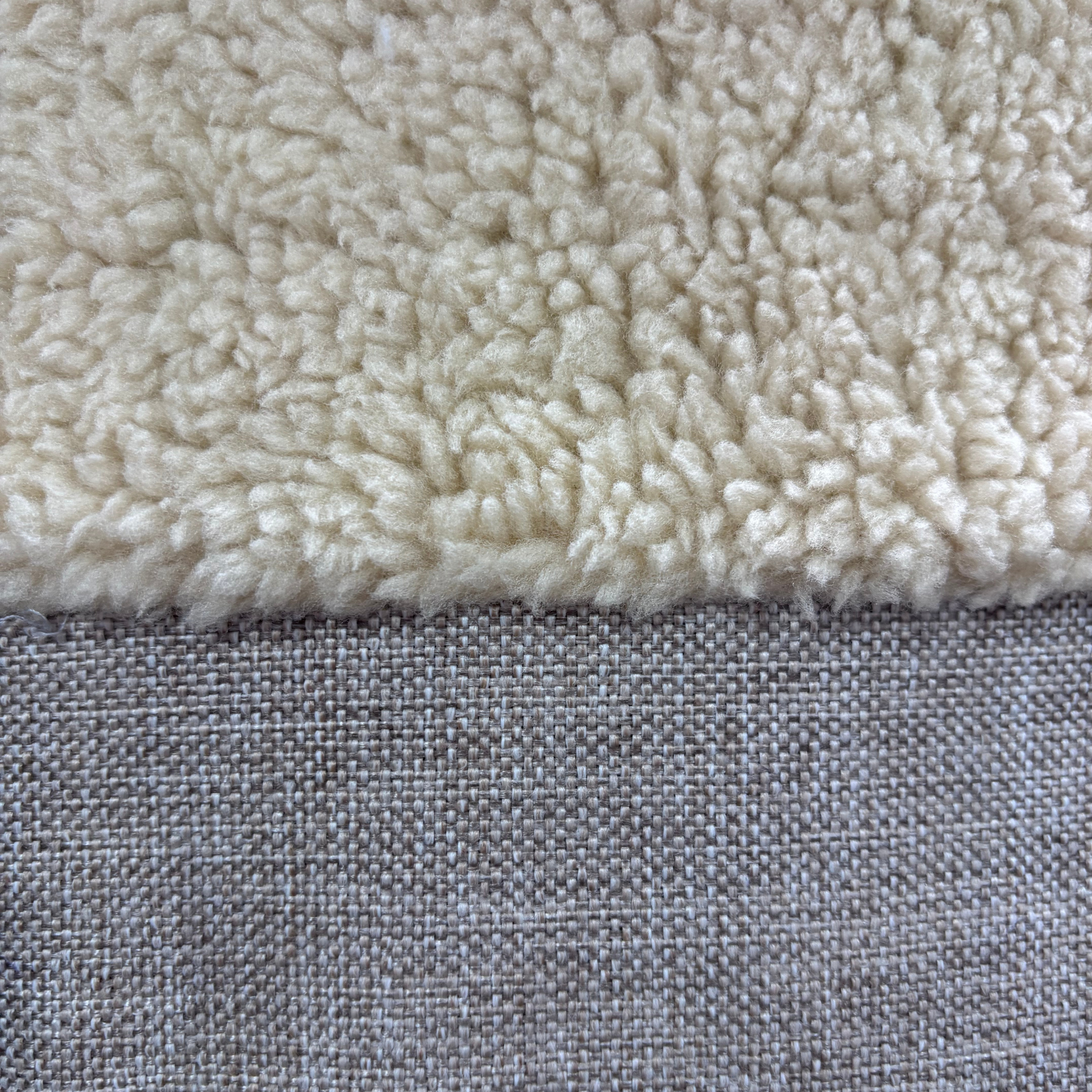 Close-up of beige sherpa fleece and woven linen textile fabric textures