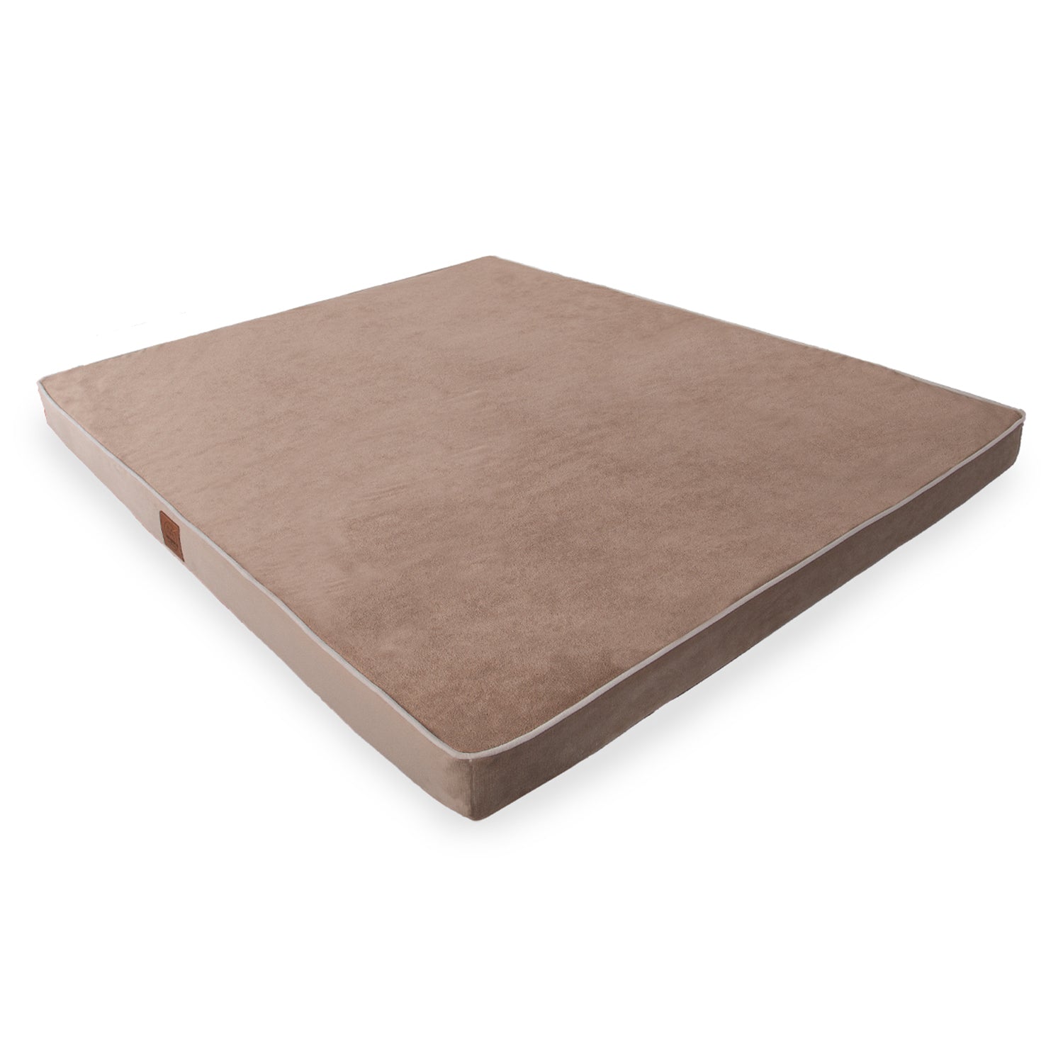 Beige rectangular floor cushion with soft fabric and white trim, home textile product