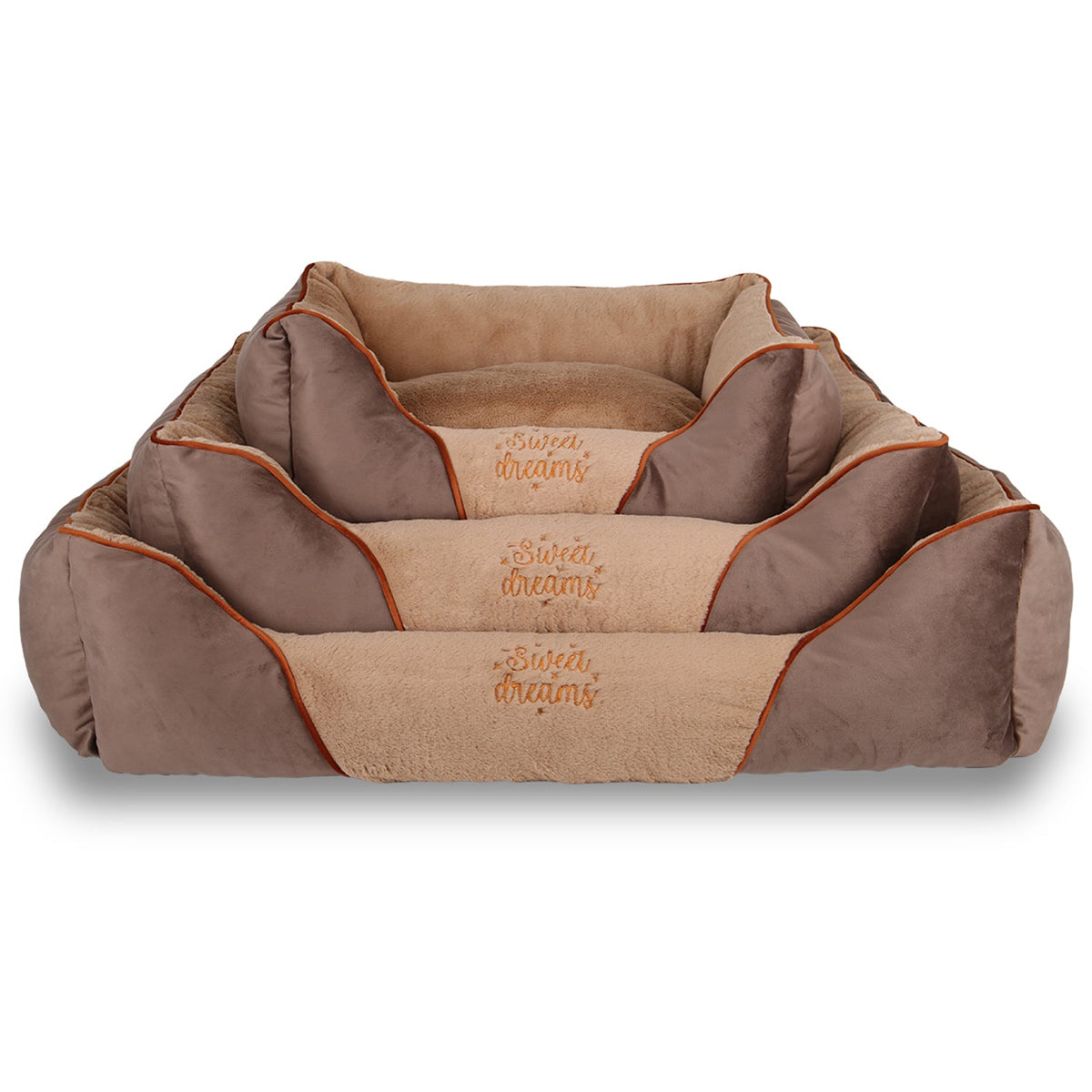 Stacked brown pet beds with beige lining and 'Sweet dreams' embroidered on the front.