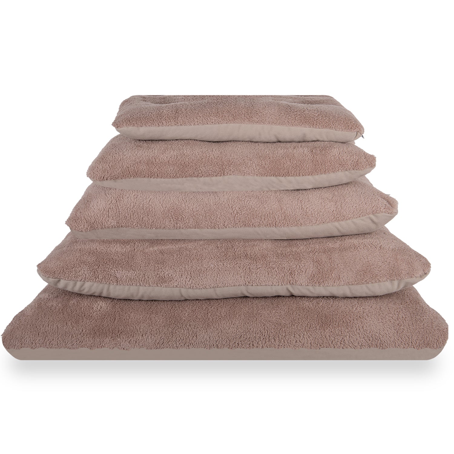 Stack of soft beige pet beds in multiple sizes, fluffy fabric, on white background