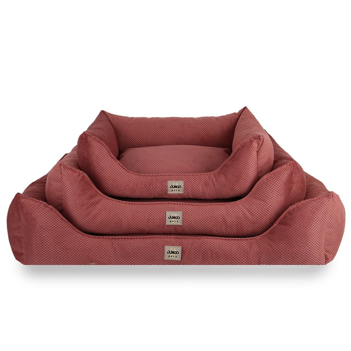 Stack of three red textured rectangular pet beds with soft raised sides, different sizes.