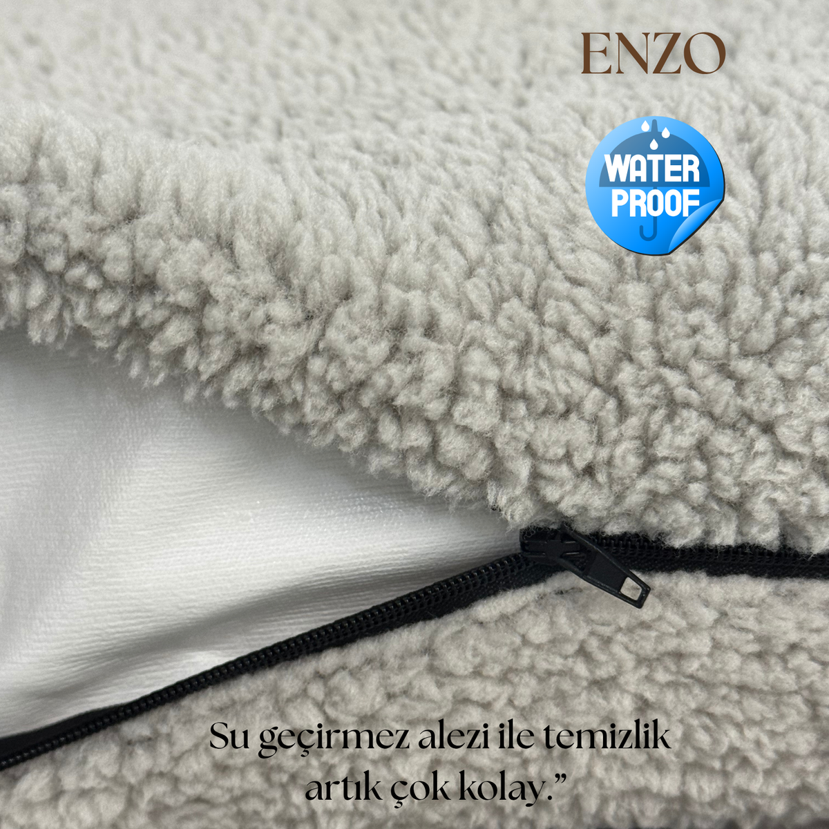 Close-up of a waterproof, zippered, textured mattress protector in light grey fabric.