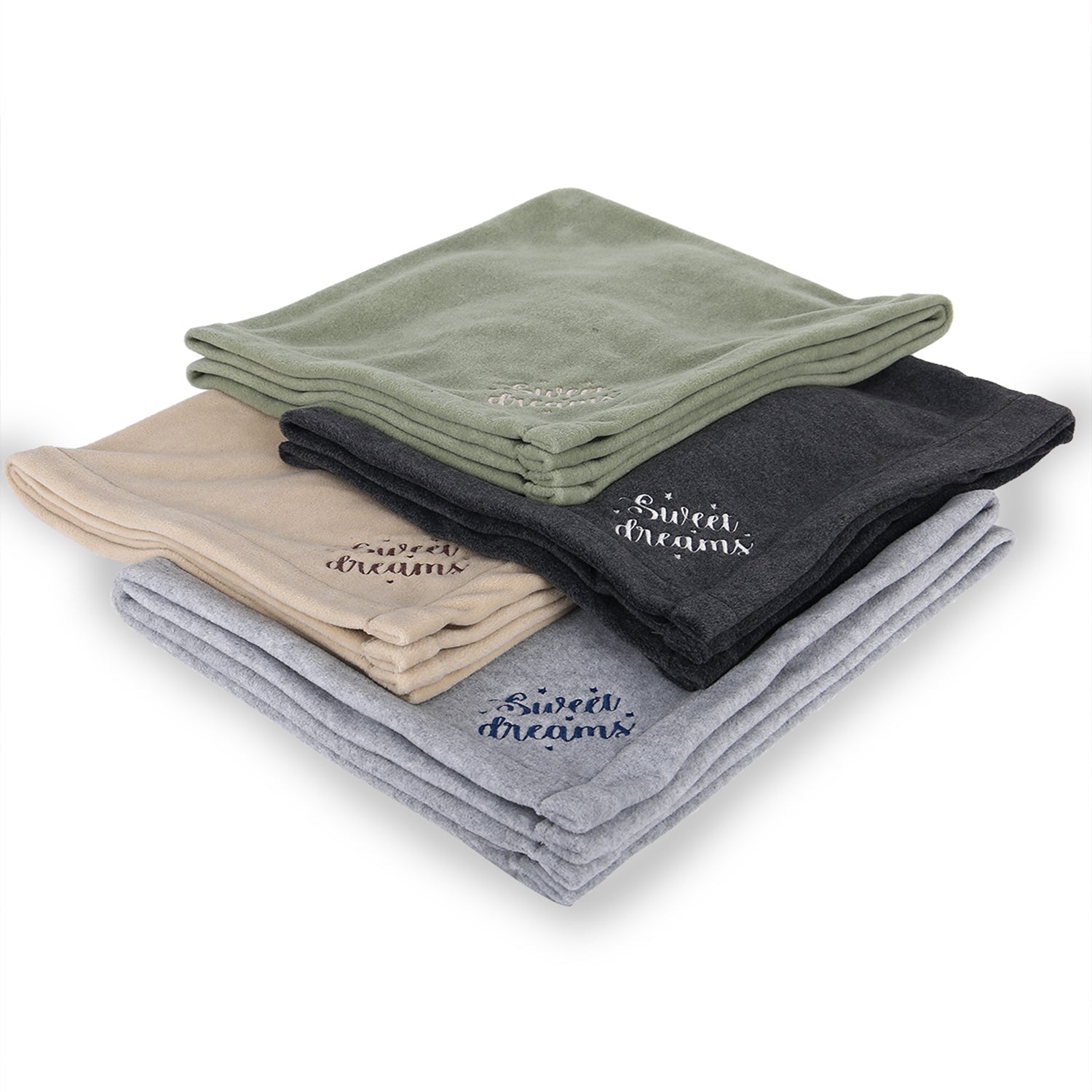 Stack of soft fleece blankets in green, beige, gray, and black with 'Sweet dreams' embroidery