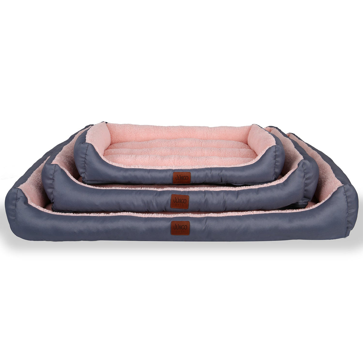Stacked pink and gray rectangular pet beds in three sizes with soft plush interior