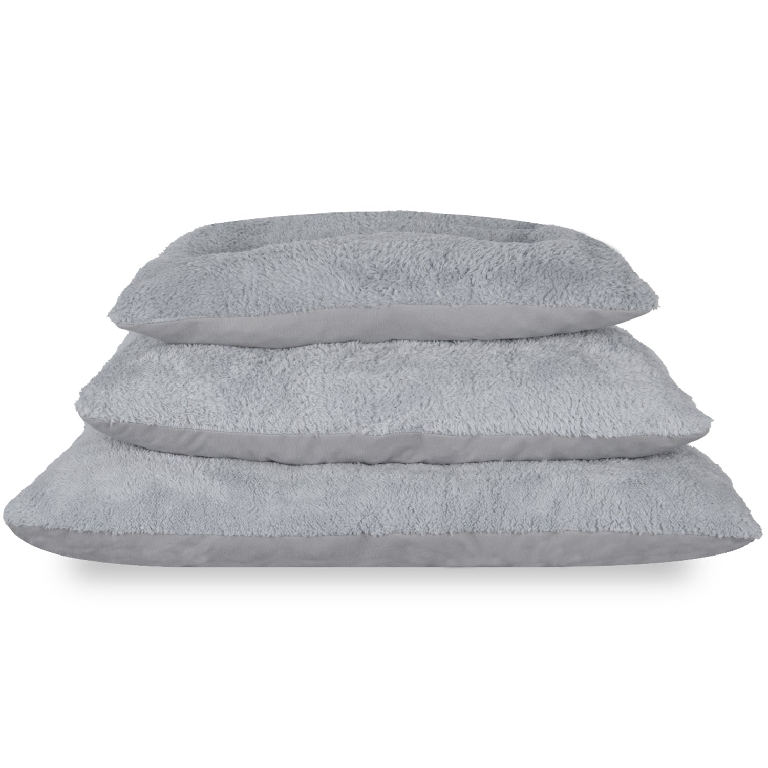 Stack of three light grey washable reversible pet cushions on white background