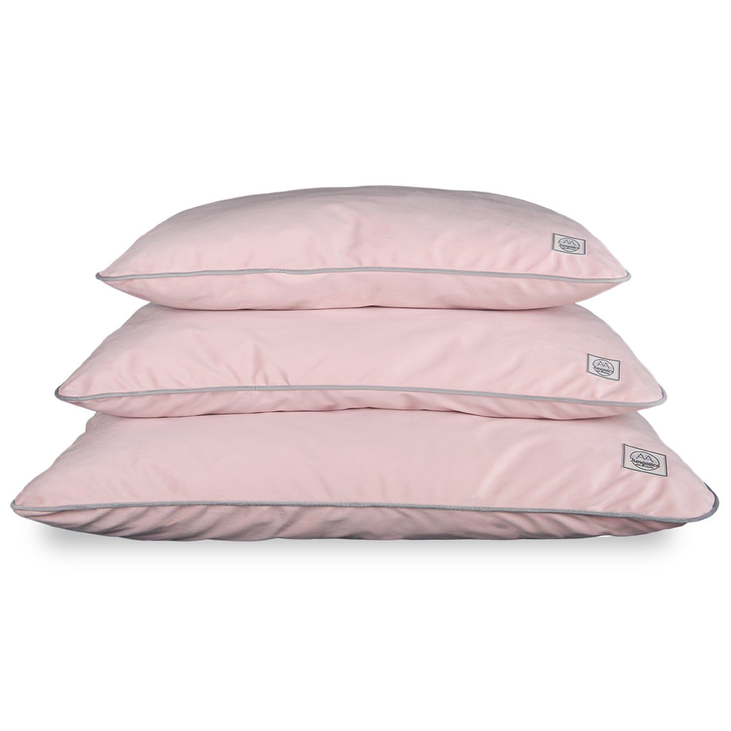Stack of three light pink pet cushions with removable, durable, non-shedding covers