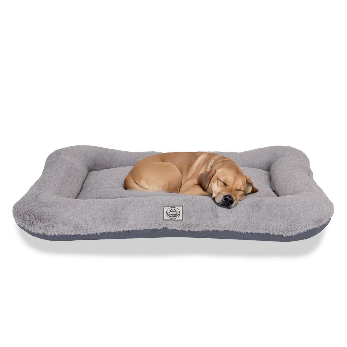 Large beige dog sleeping on a plush grey waterproof pet bed against white background