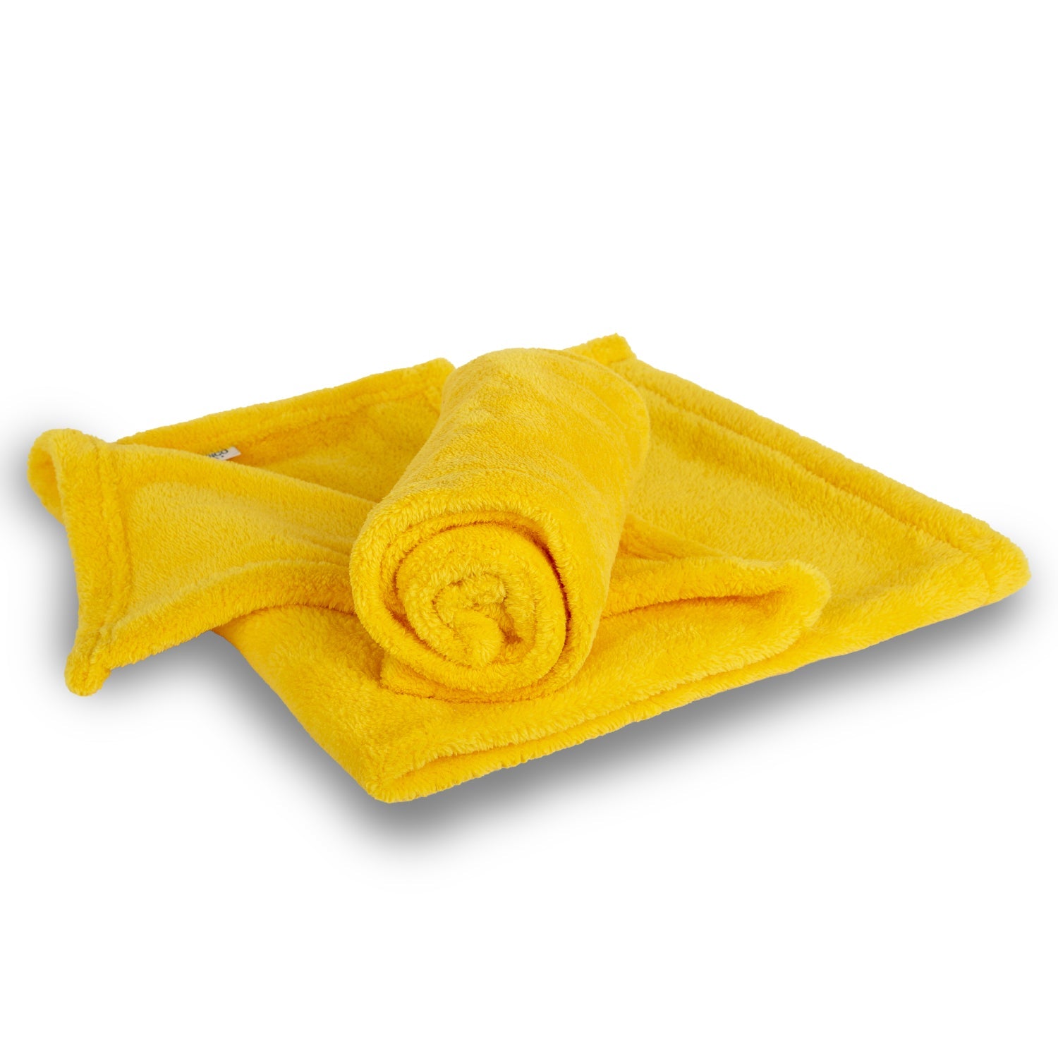 Soft yellow microfiber towel rolled and folded on white background
