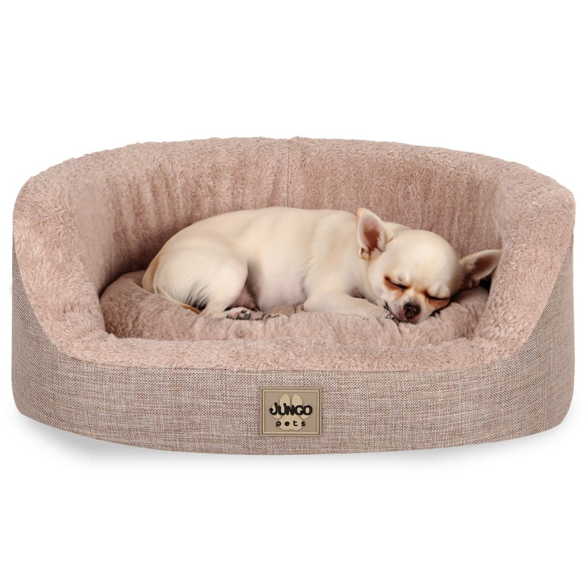 Small dog sleeping in a soft, beige, removable cover pet bed with plush sides