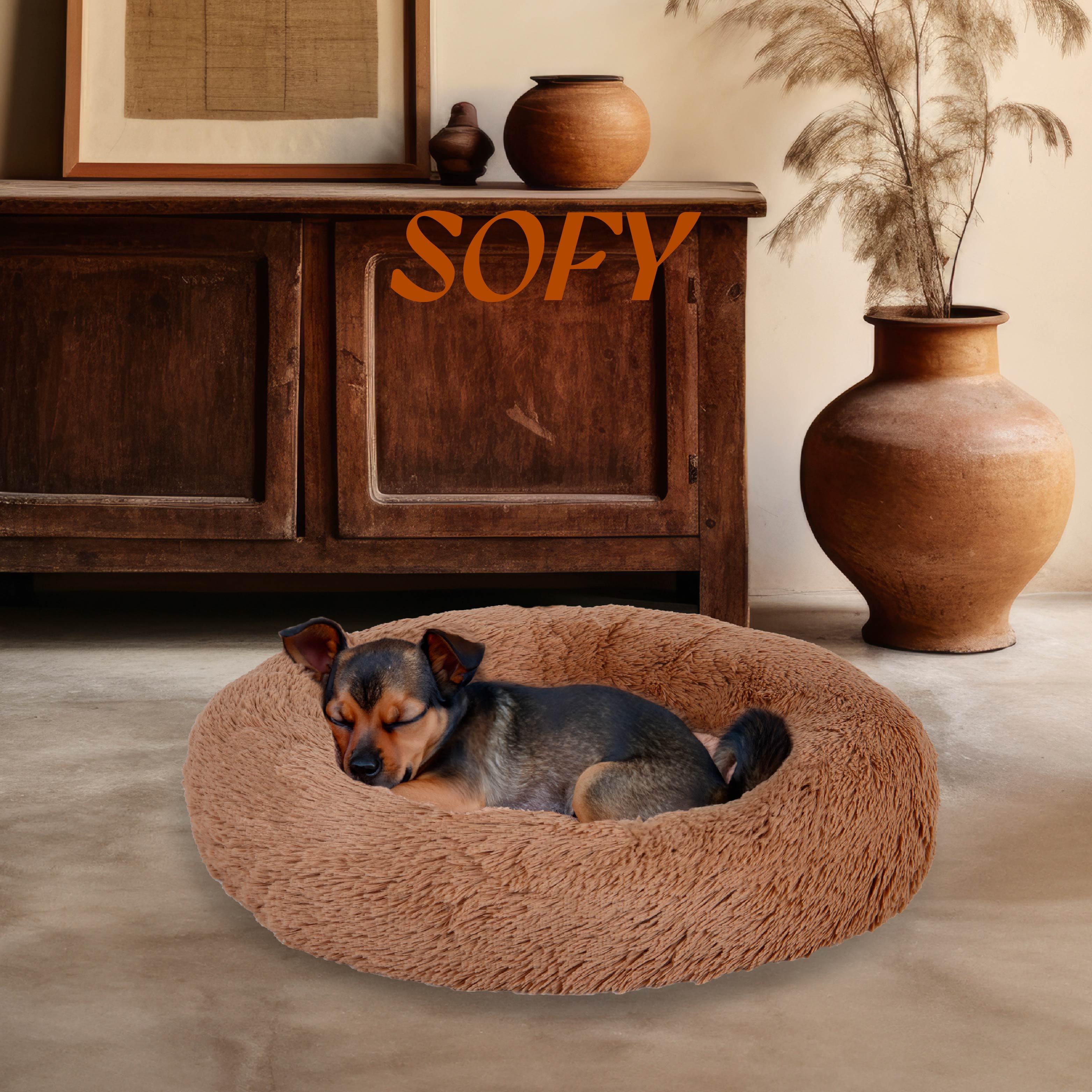Small dog sleeping in a round, plush beige pet bed in a cozy rustic living room